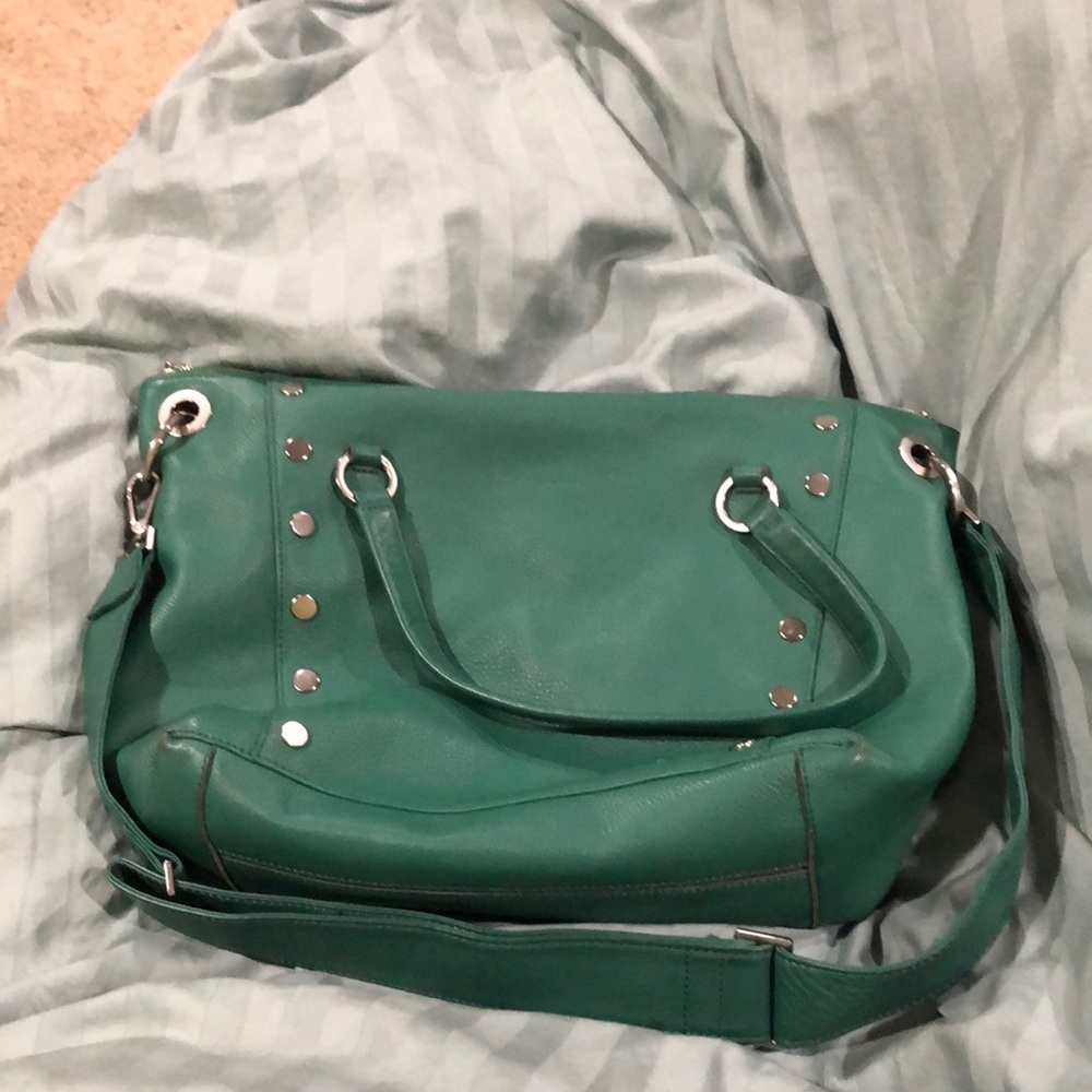 Hammitt green with silver hardware. Good condition.
